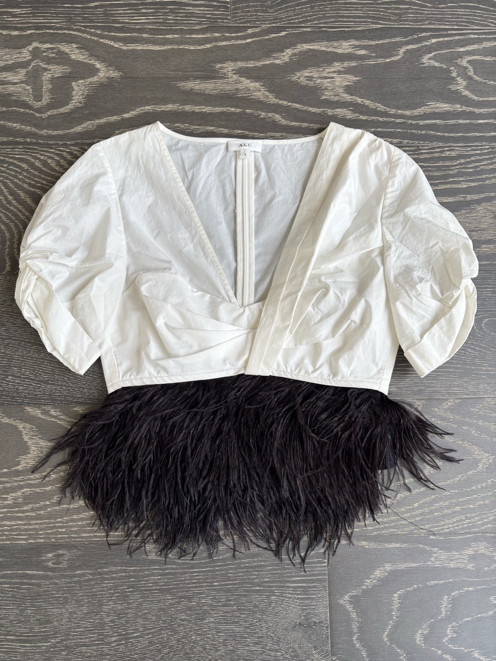 A.L.C. White V-Neck Puff Sleeve Crop Top with Black Feather Hem